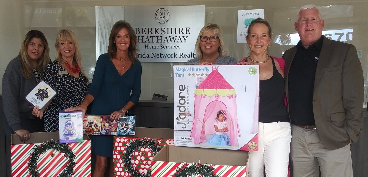 Berkshire Hathaway HomeServices Florida Network Realty is collecting new, unwrapped toys for Toys for Tots at its Ponte Vedra Beach/Nocatee office. Pictured from left are Ilka Goitia-Sepulveda, Theresa LaPolla, Holly Hayes, Pam Belcher, Kathy Wussler and Bill Irwin.